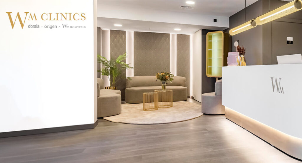 WM Clinics inside clinic, waiting area with WM Clinics logo on walls